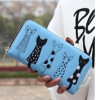 Dress‑appliqué wallet