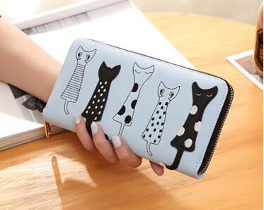 Dress‑appliqué wallet
